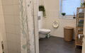 Bad mit bodentiefer Dusche und Wanne